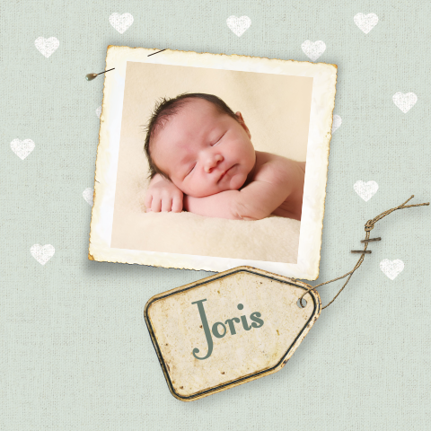 Vintage geboortekaartje voor een jongen met een label en een foto
