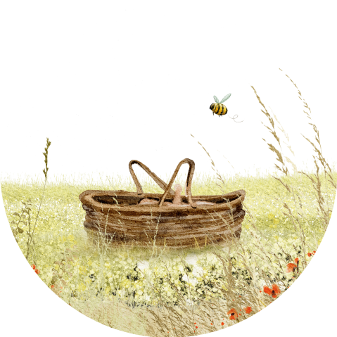 Sluitsticker voor geboorte met een mandje in het gras