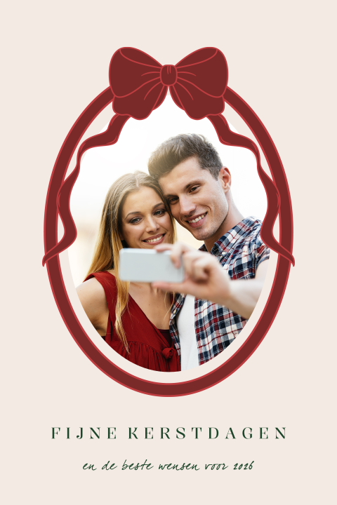 Stijlvolle kerstkaart met rode strik en eigen foto