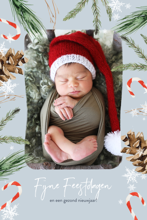 Eerste kerstkaart baby met babyfoto en zuurstokken