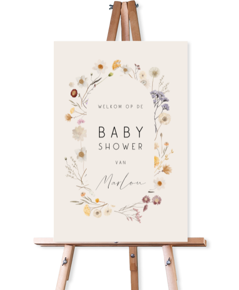 Botanisch babyshower bord met wilde bloemen in zachte tinten