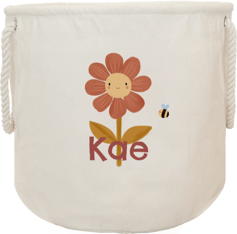 Speelgoedmand met naam en bloem met gezichtje