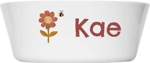 Vrolijke kinderkom met bloem en bijtje