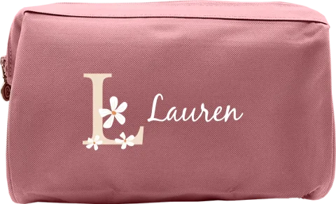 Vrolijke toilettas met naam, initiaal en bloemen