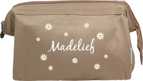 Toilettas met naam en madeliefjes