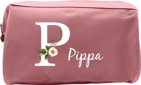 Vrolijke toilettas met naam en bloemen