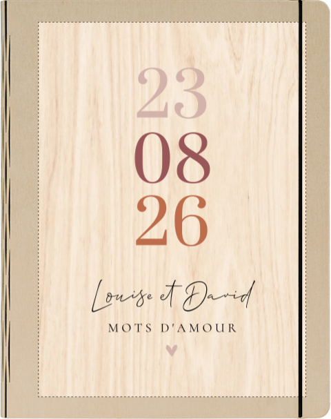 Livre d'or en bois avec date du mariage dans un effet rose ombré