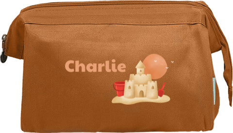 Toilettas met naam en zandkasteel