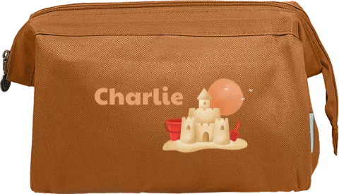 Toilettas met naam en zandkasteel