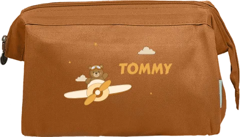 Toilettas met beertje in vliegtuig en naam