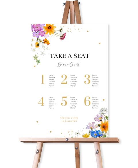 Tafelschikking bord bruiloft zomerse bloemen paars