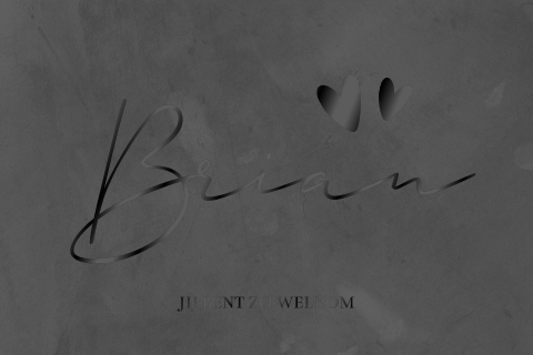 Stoer geboortekaartje voor een jongen met zwartfolie en hartjes