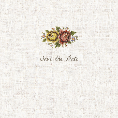 Mooi stijlvolle save the date kaart met linnen achtergrond en borduur
