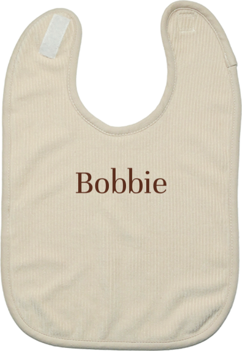 Corduroy slabbetje met naam geborduurd