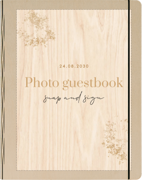 Houten gastenboek met goudkleurige spetters