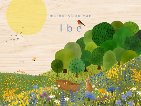 Memorybox met een heuvellandschap en blauwe bloemen
