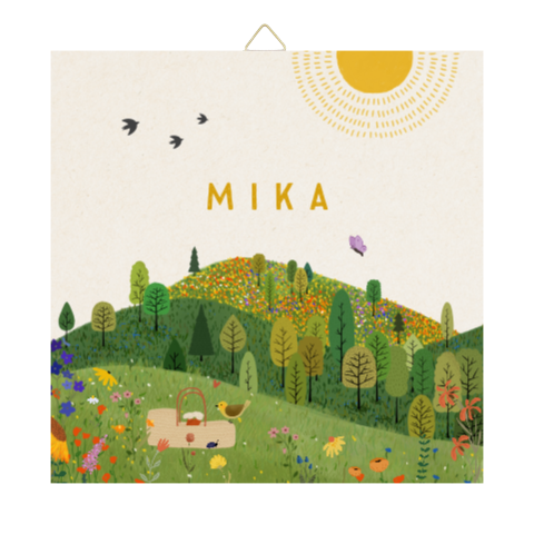 Geboortetegeltje met een heuvellandschap en bloemen