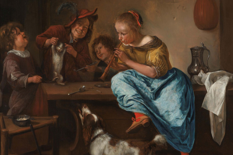 Vrolijke wenskaart met hond en kat rond de tafel