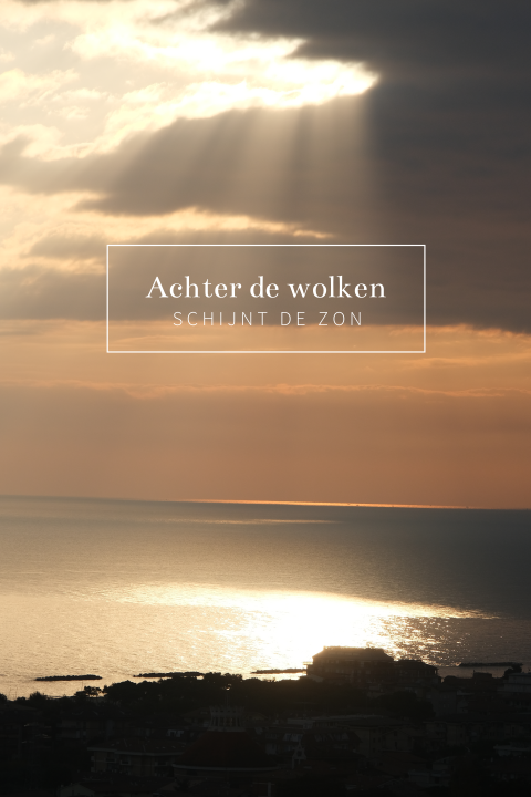 Dankbetuiging met zee en doorbrekende zon