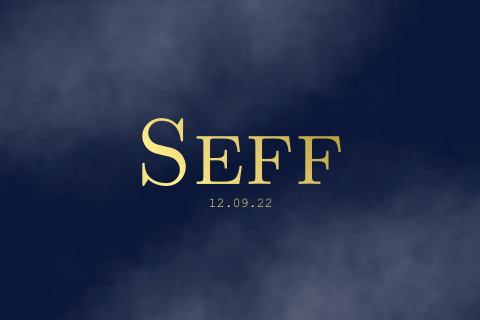 Donkerblauw geboortekaartje voor een jongen met goudfolie en wolken