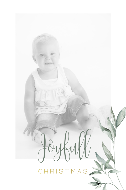 Weihnachtskarte mit grünen Blättern und einem persönlichen Foto