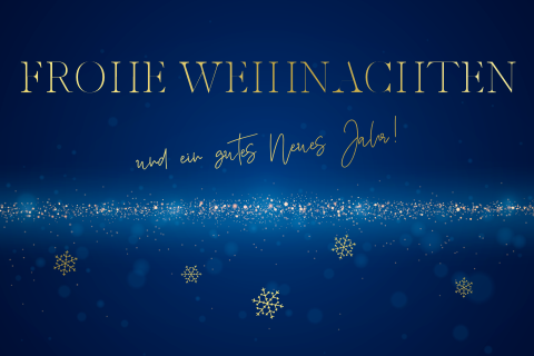 Weihnachtskarte mit blauem Hintergrund und Schneeflocken