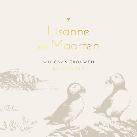 Luxe trouwkaart met papegaaiduikers op klif bij oceaan