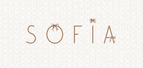 Geboortekaart met gebreid patroon en strikjes