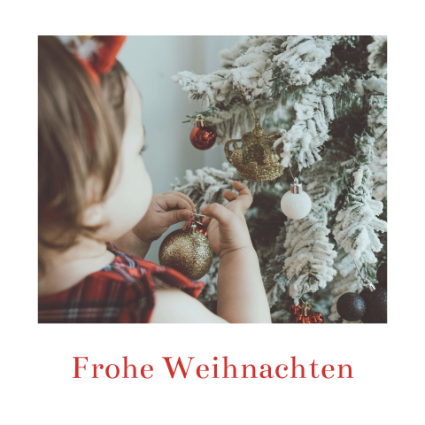 Weihnachtskarte mit roter Schrift und Foto