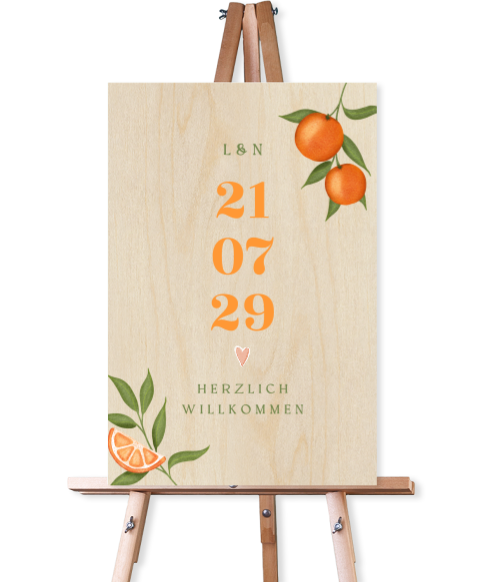 Willkommensschild zur Hochzeit aus Holz mit Orangen und Datum