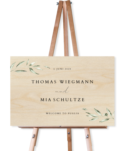 Schliches Willkommensschild zur Hochzeit aus Holz mit Blättern