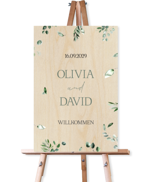 Botanisches Willkommensschild zur Hochzeit aus Holz mit Eukalyptusblättern