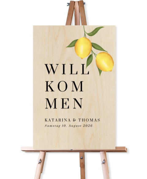 Sommerliches Willkommensschild zur Hochzeit aus Holz mit Zitronenzweig