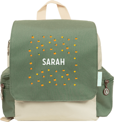 Rucksack mit Orangen und Zitronen und Name