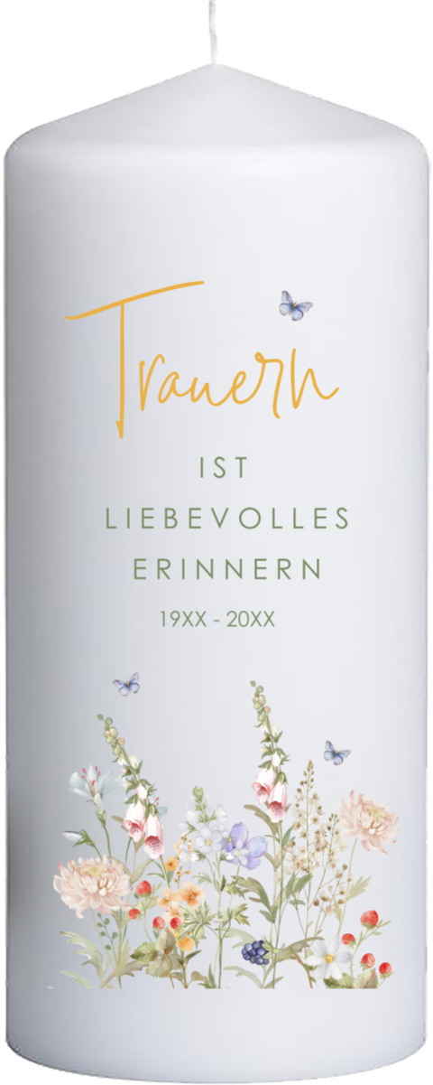 Trauerkerze mit Blumen und „Trauern ist Erinnern“